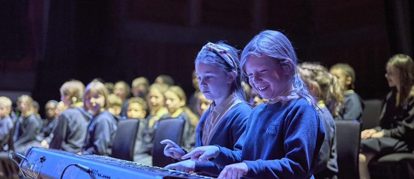 schoolchildren in orchestra